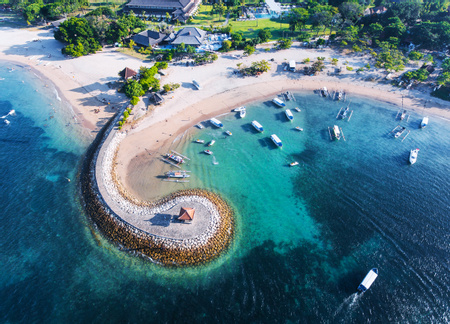 Bali coast with a figurative breakwater aerial view